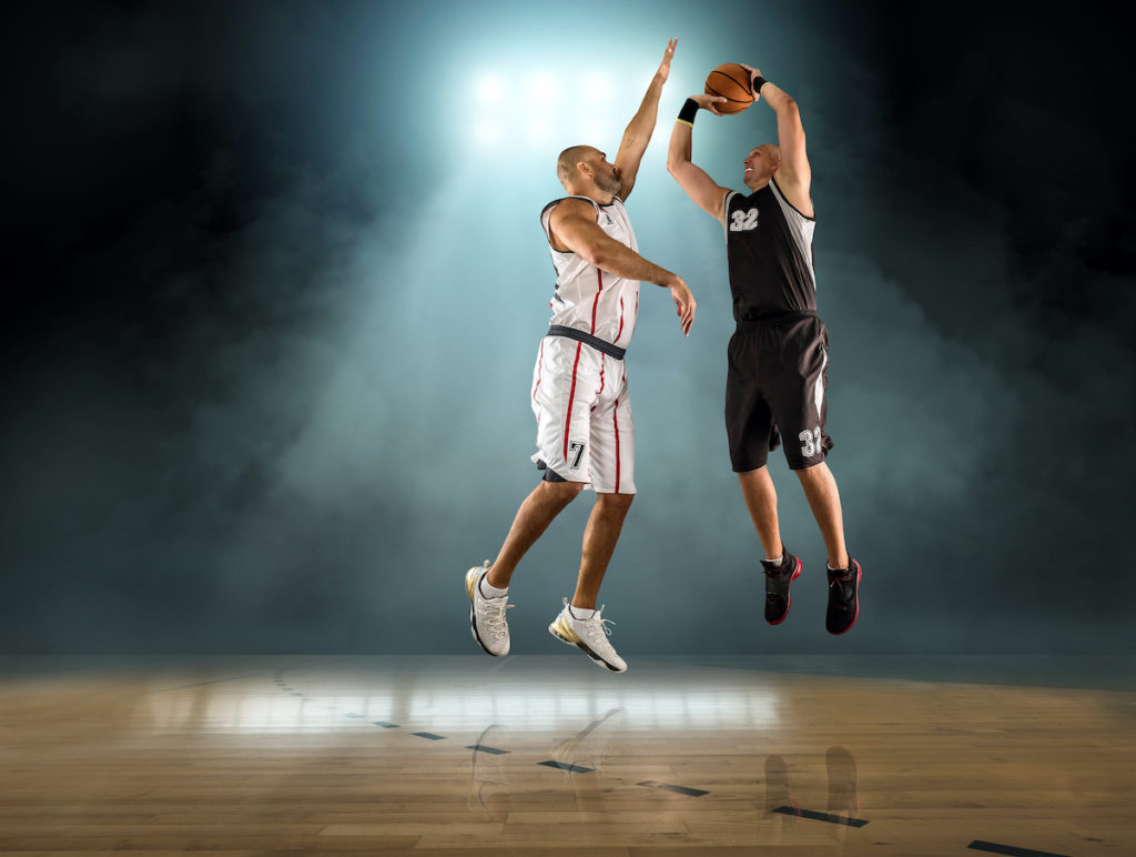 men playing basketball