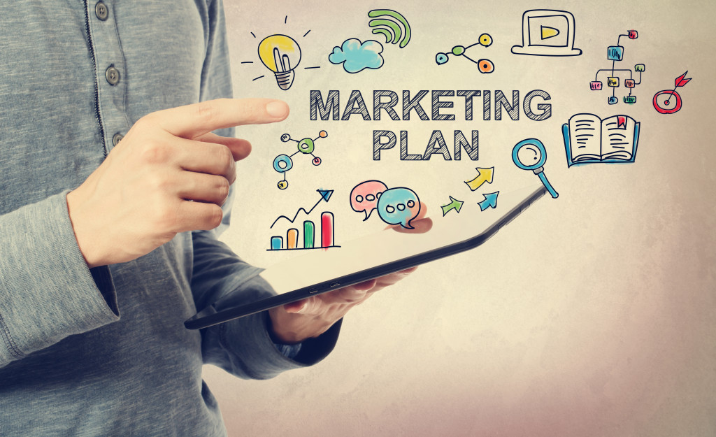 man pointing at a marketing plan concept