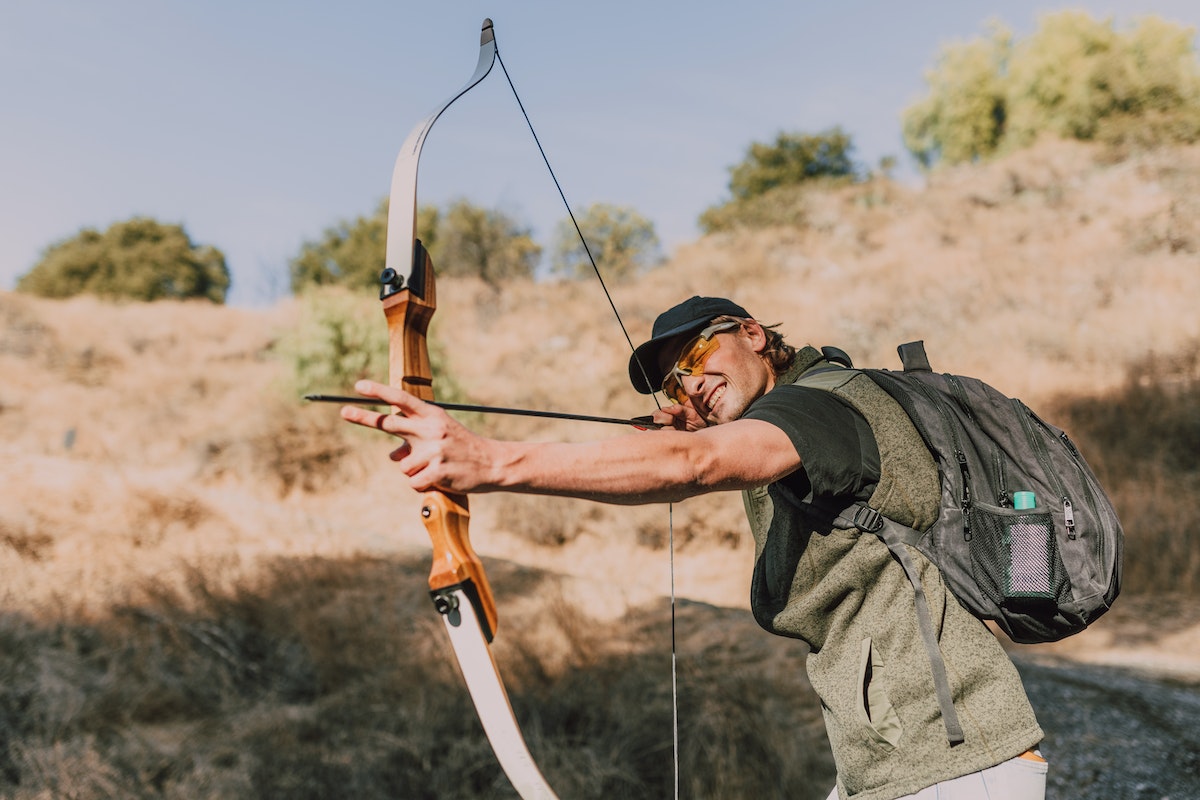 hunter using his bow