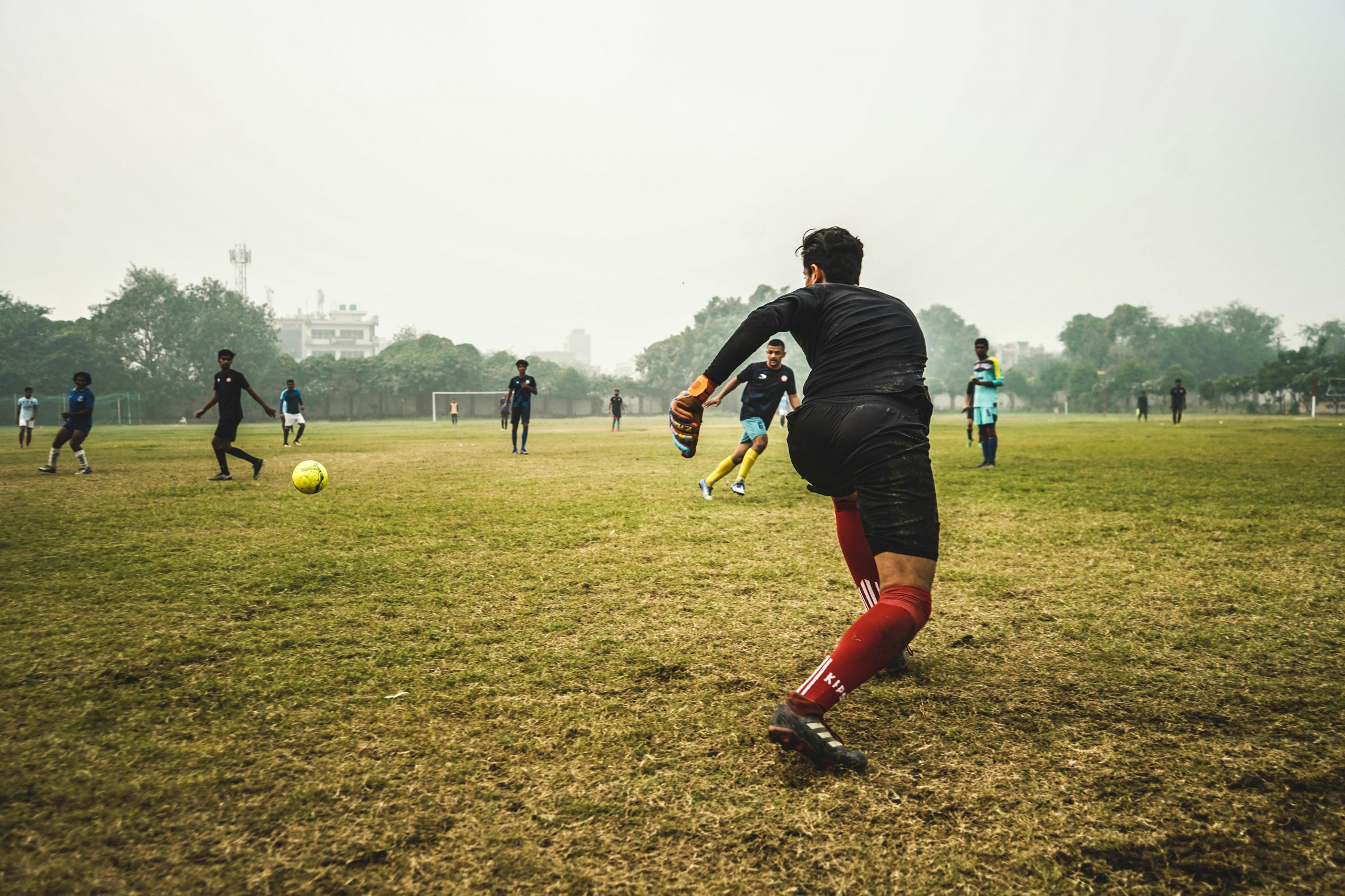 soccer game in progress on an outdoor field